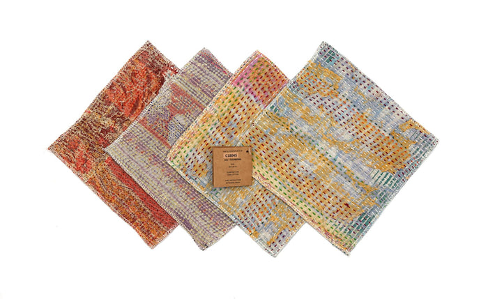 Set of 4 coasters 18x18 cm in patchwork colors (red, purple, yellow and blue/gray) with pattern and edgy weaving